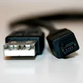 Ďalší obrázok produktu USB kábel (1.1), USB A M - 4-pin M, 0.7m, navíjacia, čierny, Logo, HIROSE