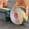 Ďalší obrázok produktu Protišmyková bezpečnostná páska Anti-Slip 60951, čierna-žltá, 50 mm x 15 m, TESA