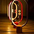 Stolná lampa Heng Balance Ellipse, čierna, 5V/1A, teplá biela, USB, s vypínačom vo vzduchu,