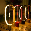 Stolná lampa Heng Balance Ellipse, čierna, 5V/1A, teplá biela, USB, s vypínačom vo vzduchu,