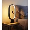 Stolná lampa Heng Balance Ellipse, čierna, 5V/1A, teplá biela, USB, s vypínačom vo vzduchu,