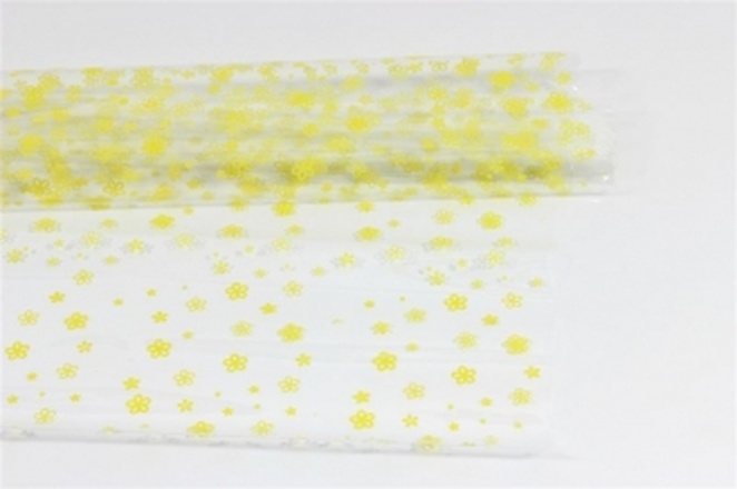 Papírenské zboží - Celofánové archy s potiskem 25my 70x100 cm - žlutá kvítečka [25 ks]